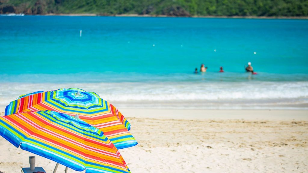 tourists enjoy at a beach in Culebra island 