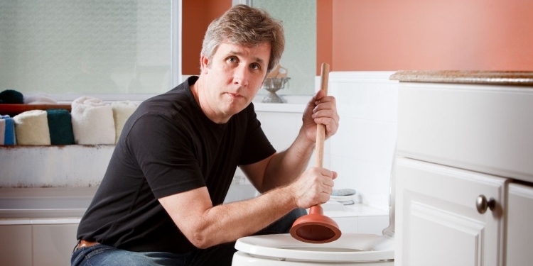Unclogging a toilet