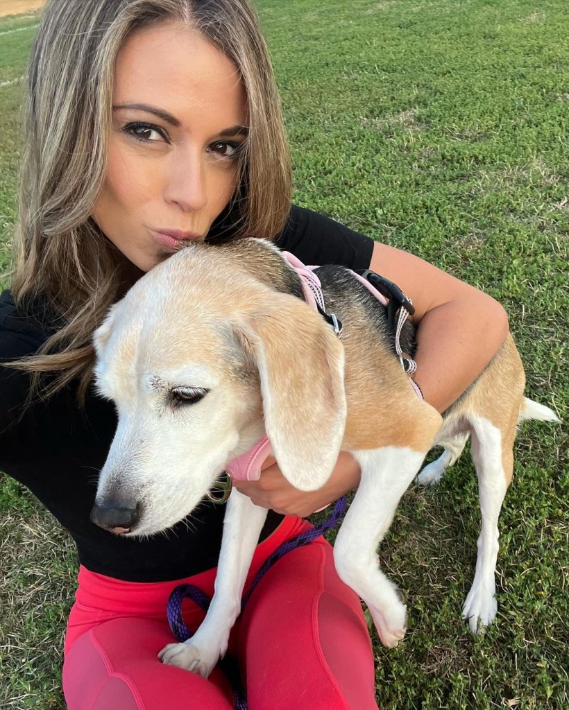 Cheryl posing with her pet Lola