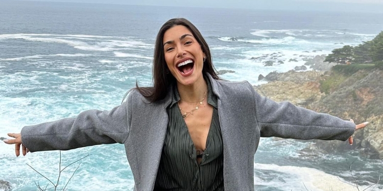 Nikki Howard wearing Grey suit with black shirt