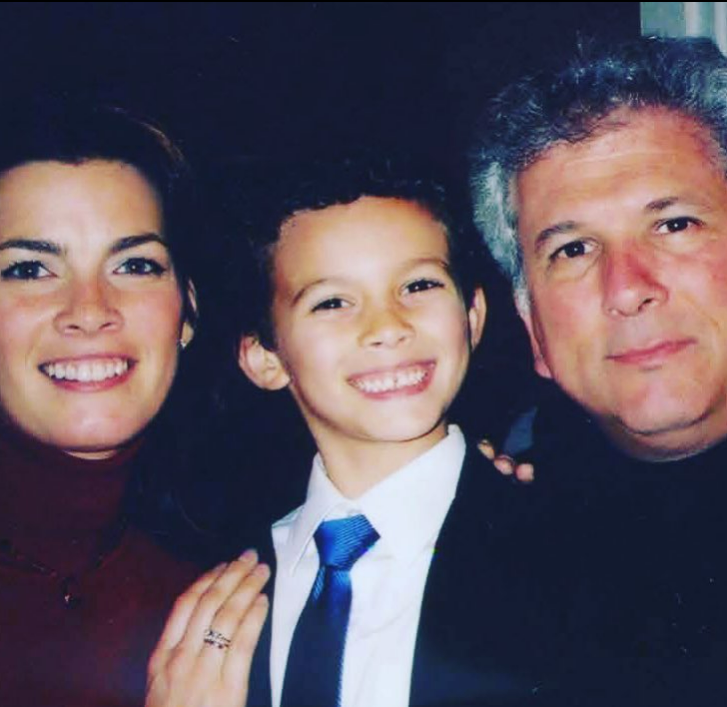 Jerry Solomon with his wife and son